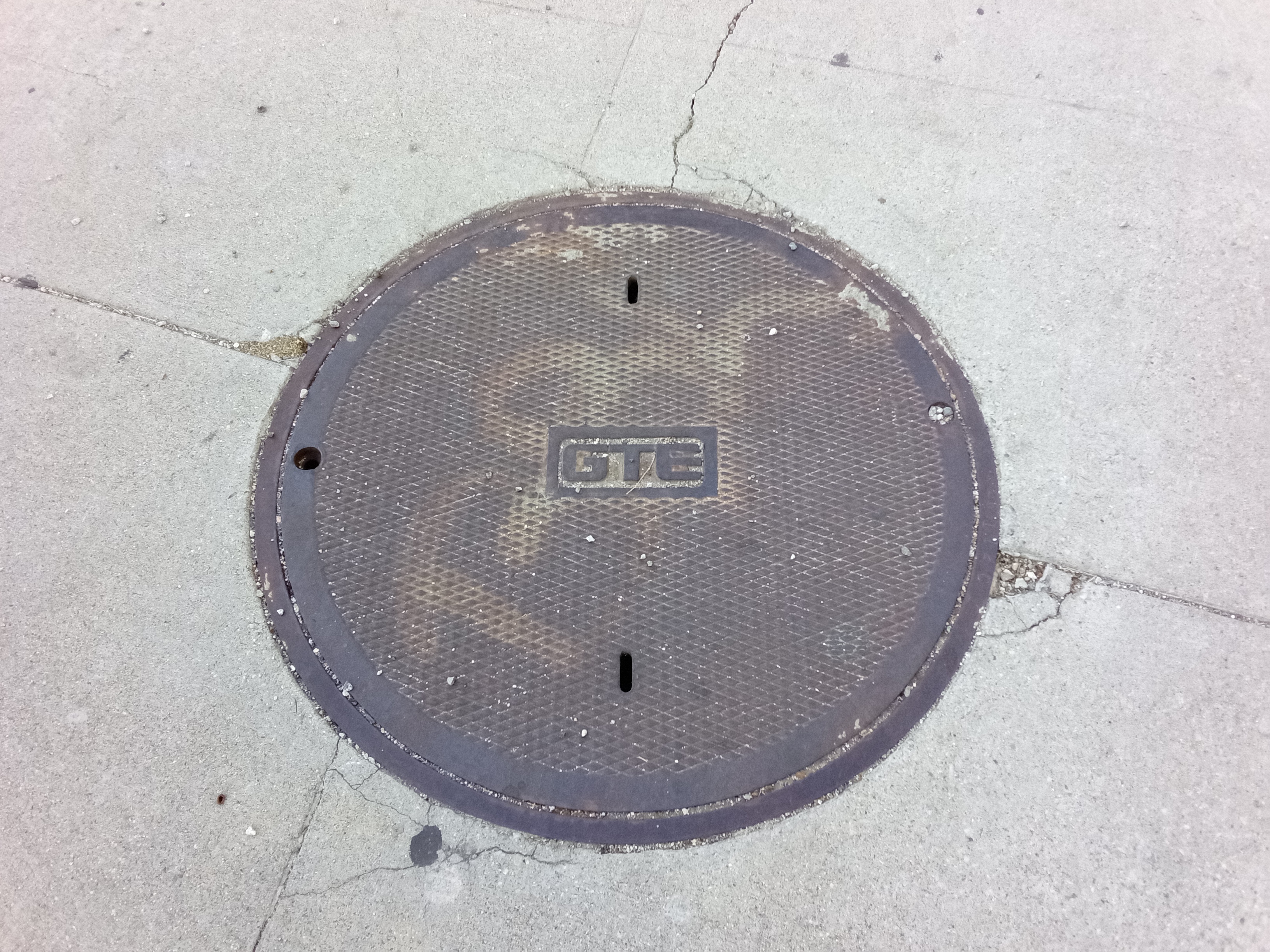 Old GTE manhole cover Old GTE manhole cover